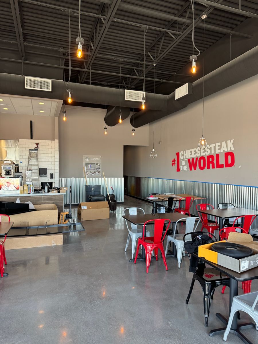 Dining room with graphics and seating going in