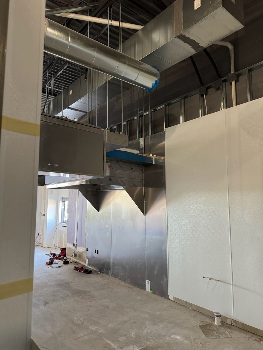 Kitchen hood and stainless wall panels