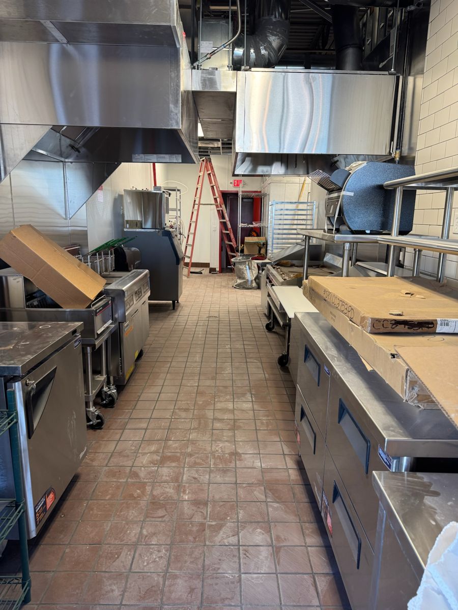 Cook line with fryers and prep stations