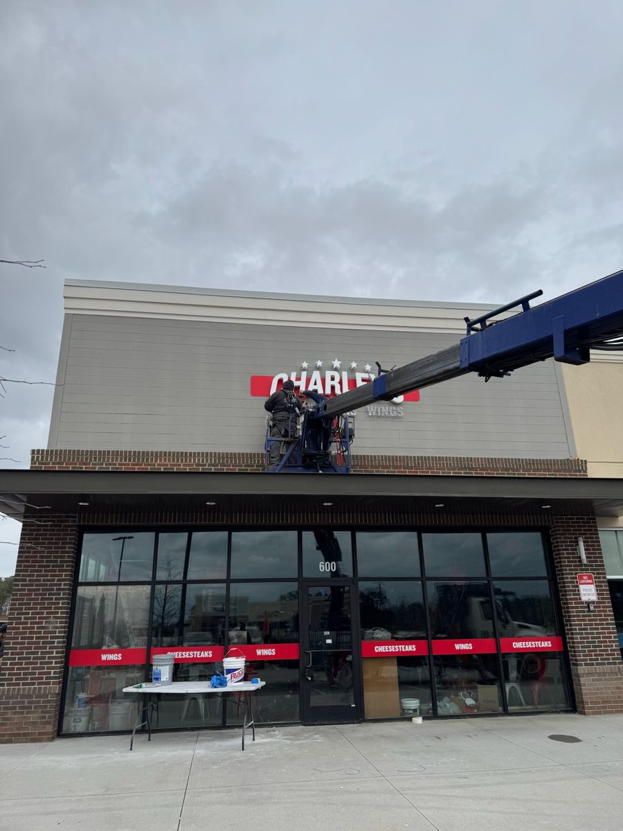 Installing the Charleys sign